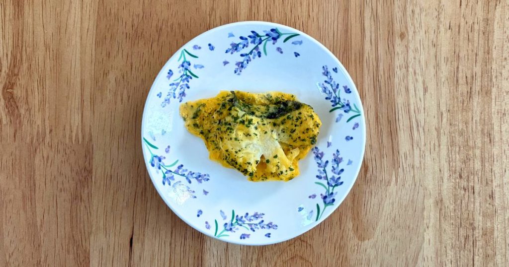 冷凍離乳食「ファーストスプーン」の12～18カ月用メニュー「たらのピカタ」の写真